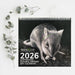 2026 Australian Natural History Art Calendar with a possum illustration on a white background with eucalyptus leaves.
